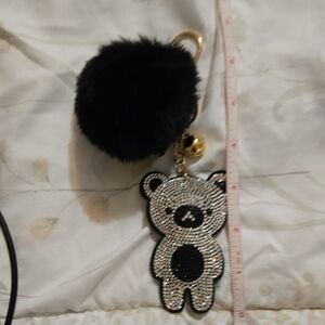 Keychain/Bag Charm In Black And Silver Featuring A Pom Pom And Teddy Bear